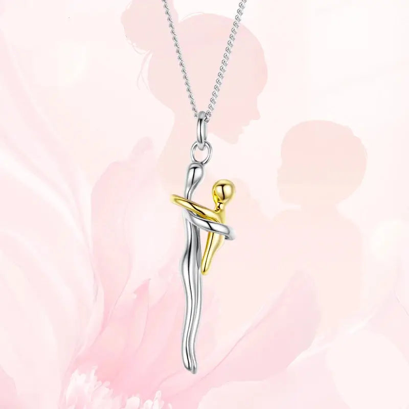 Mother & Child Necklace,
925 Sterling Silver Necklace,
Mother’s Day Gift Necklace,
Sterling Silver Hug Pendant,
Two-tone Silver and Gold Necklace,
Family Bond Necklace,
Sentimental Jewellery for Mum,
Mom and Child Jewellery,
Meaningful Jewellery for Mum,
Keepsake Necklace for Mum