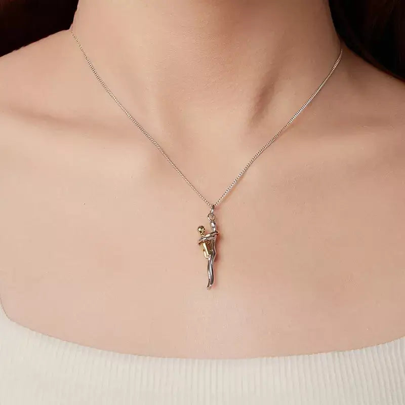 Mother & Child Necklace,

925 Sterling Silver Necklace,

Mother’s Day Gift Necklace,

Sterling Silver Hug Pendant,

Two-tone Silver and Gold Necklace,

Family Bond Necklace,

Sentimental Jewellery for Mum,

Mom and Child Jewellery,

Meaningful Jewellery for Mum,

Keepsake Necklace for Mum