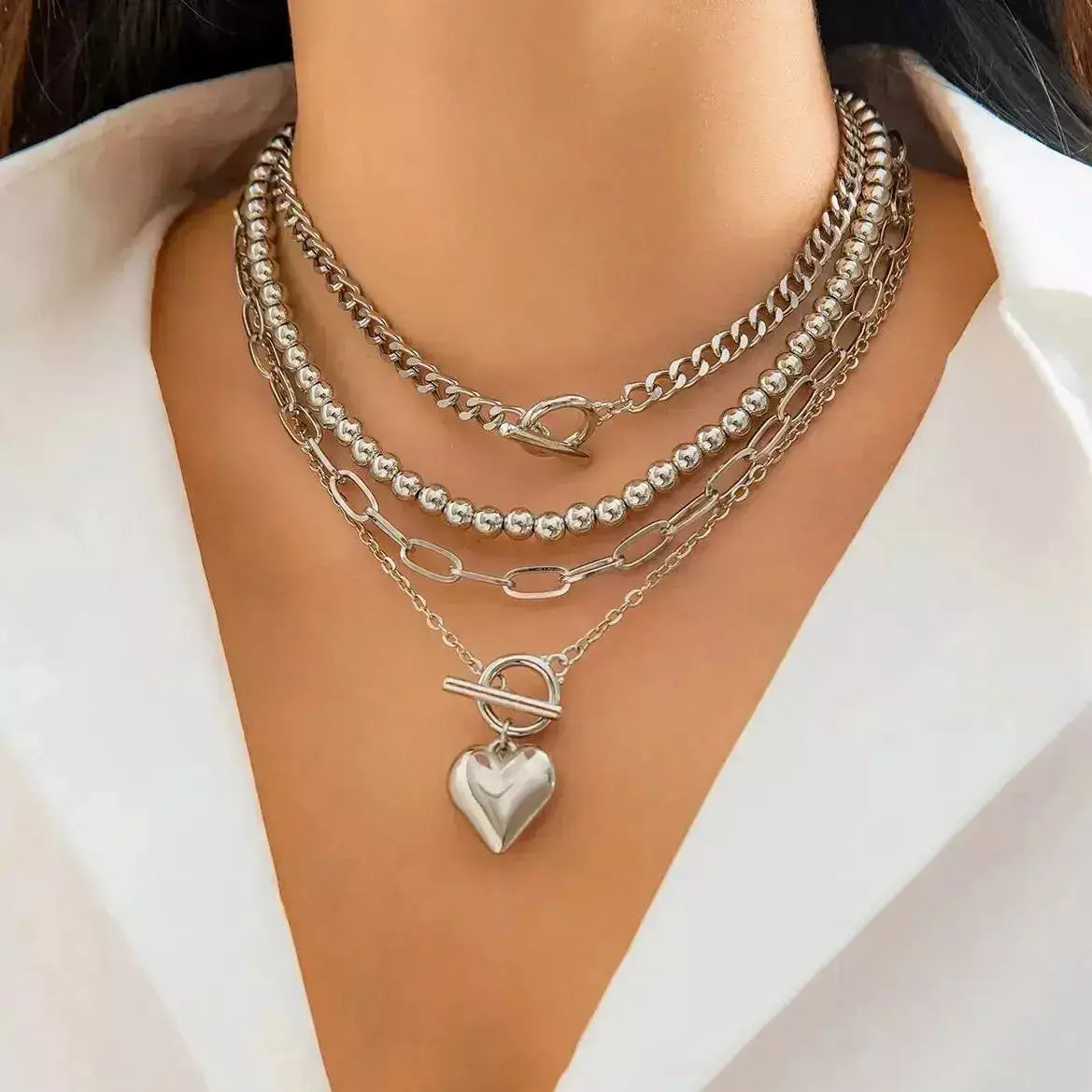 layered gold necklace set, heart pendant necklace UK, women’s layered jewellery, gold choker necklace set, trendy 2024 necklaces, multi-layer necklace for women, Y2K gold accessories, elegant gold chain set, 4-in-1 necklace gift for her, fashionable layered necklace UK