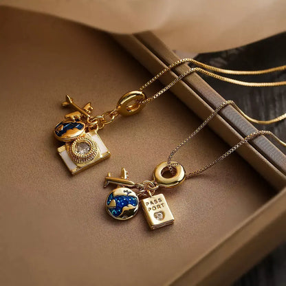 women’s necklace, travel necklace, adventure necklace, map and airplane necklace, elegant jewellery, sophisticated accessory, modern necklace, gift for her, explorer necklace, copper necklace, meaningful necklace, gift for traveller