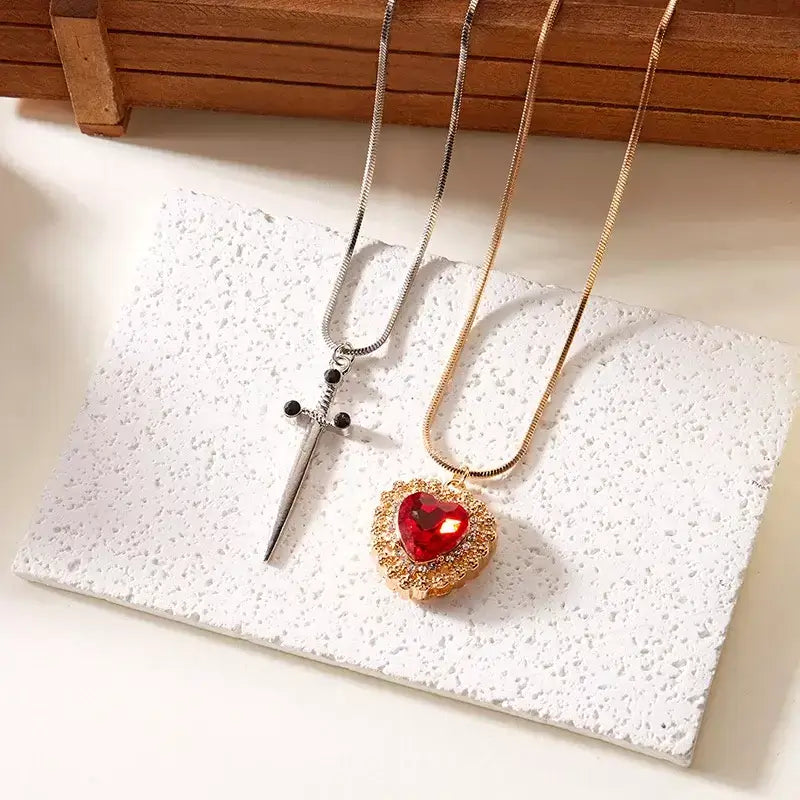 Heart & Sword Zircon Necklace Set - Buy 1, Get 2,
buy heart sword necklace, heart sword necklace UK online, romantic jewellery gift for girlfriend, unique valentine’s gift for her, affordable zircon necklace set, waterproof stainless steel heart necklace, heart sword zircon necklace set, heart and sword pendant meaning, zircon crystal heart necklace, unique couple necklace set, stainless steel romantic jewellery