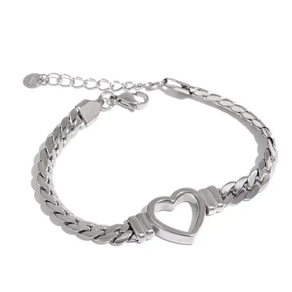 women’s heart bracelet, heart bracelet for women, gold heart bracelet, silver heart bracelet, stainless steel heart bracelet, elegant bracelet for women, meaningful jewellery for her, dainty heart bracelet, bracelet gift for girlfriend, adjustable heart bracelet, romantic gift for her UK, minimalist heart bracelet
